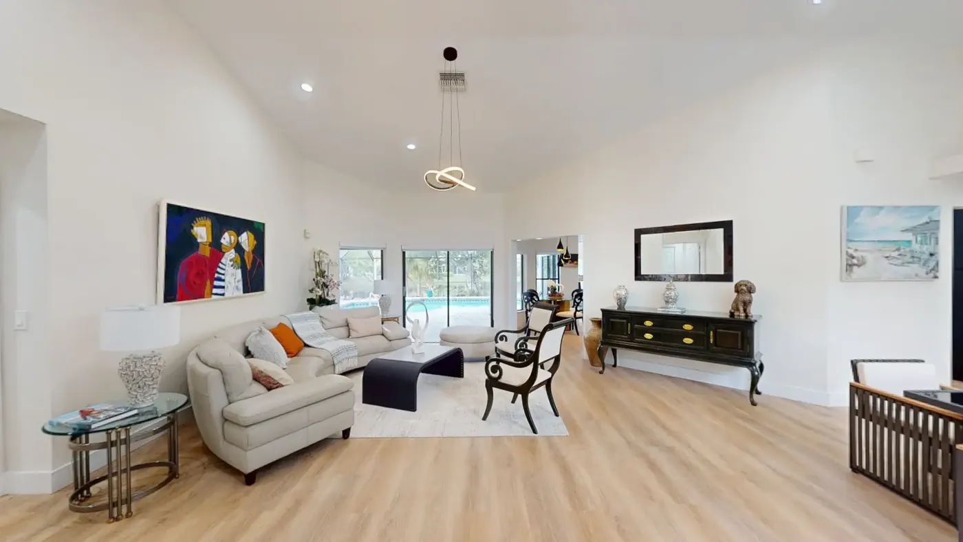 A modern open-plan living and dining interior in a Crestview-managed property